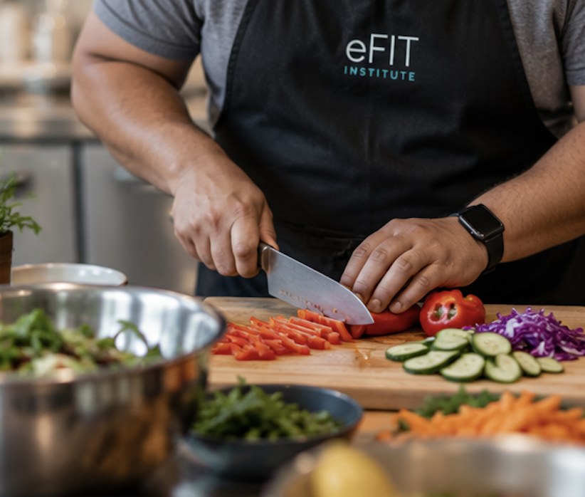 A member preparing fresh ingredients at eFIT