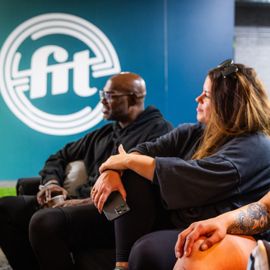Two people sitting on the sofa during a group therapy session at eFit Institute